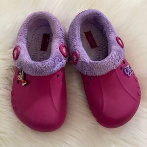Crocs kids pink and purple fleece slip on